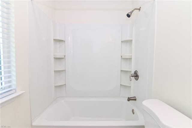full bathroom with toilet and shower / bathtub combination