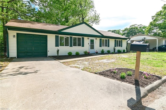 ranch-style house with a front lawn, driveway, and a garage
