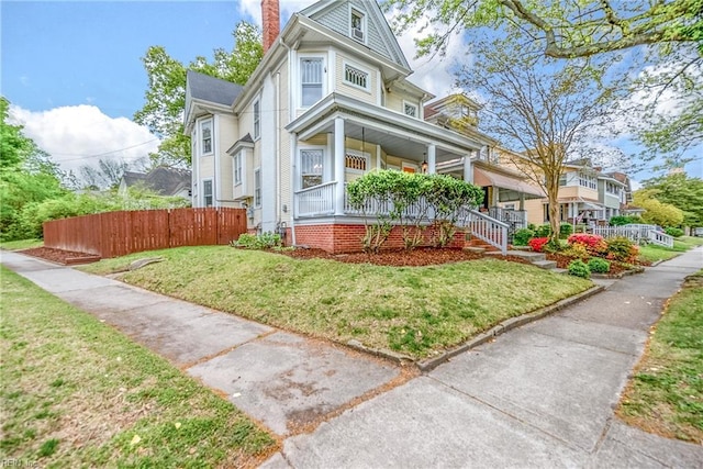 3716 Colonial Ave, Norfolk, VA 23508 - victorian-style house with a porch and a chimney