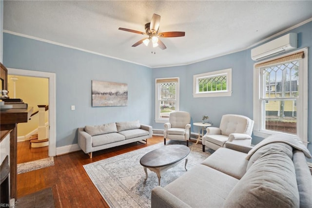3716 Colonial Ave, Norfolk, VA 23508 - living room featuring a wall mounted AC, ceiling fan, crown molding, dark wood-style floors, and baseboards