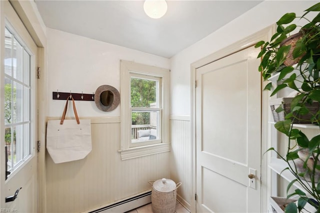 3716 Colonial Ave, Norfolk, VA 23508 - doorway to outside featuring wainscoting and a baseboard radiator
