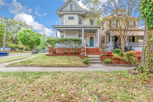 3716 Colonial Ave, Norfolk, VA 23508 - victorian home with covered porch and a front lawn