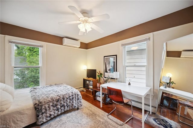 3716 Colonial Ave, Norfolk, VA 23508 - bedroom featuring an AC wall unit, wood finished floors, and a baseboard heating unit