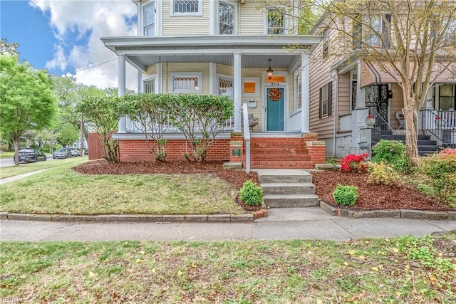 3716 Colonial Ave, Norfolk, VA 23508 - view of front of house featuring a porch and a front lawn