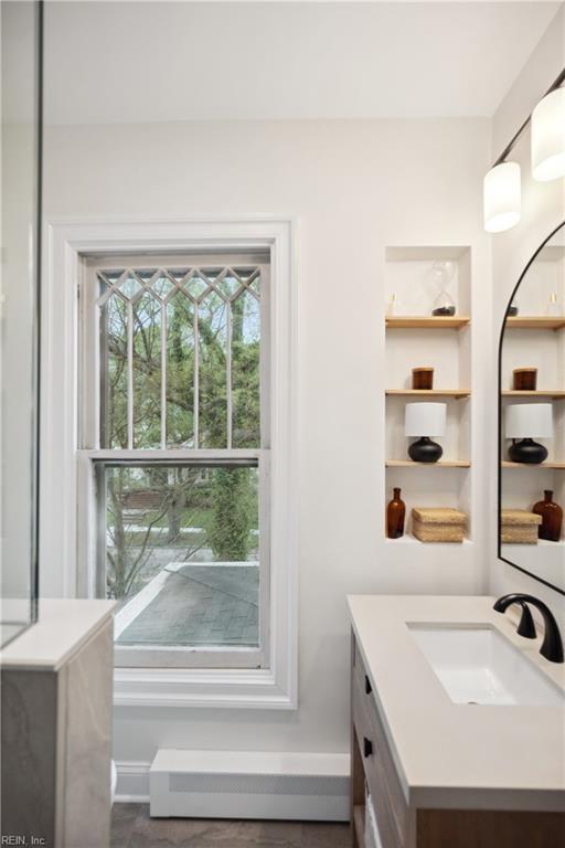 3716 Colonial Ave, Norfolk, VA 23508 - bathroom featuring vanity, baseboards, and built in shelves