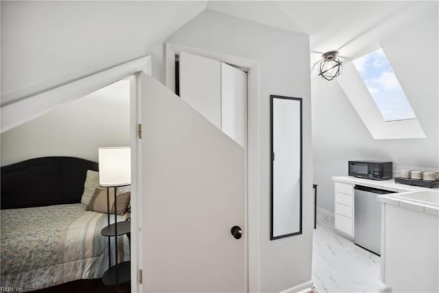 3716 Colonial Ave, Norfolk, VA 23508 - bedroom featuring light marble finish flooring, a skylight, refrigerator, baseboards, and lofted ceiling