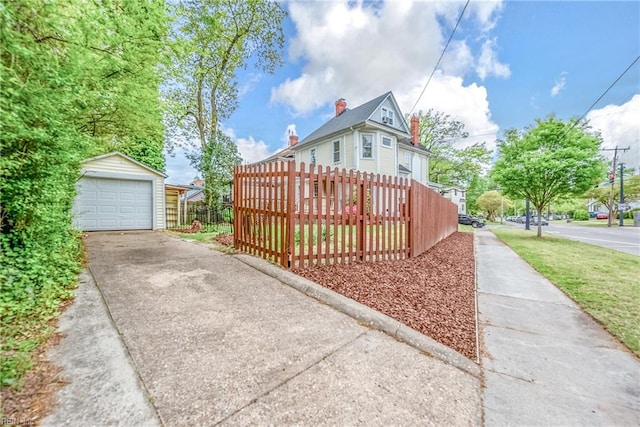 3716 Colonial Ave, Norfolk, VA 23508 - view of front of property with driveway, an outdoor structure, and a detached garage
