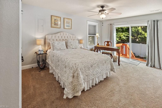 bedroom with visible vents, carpet flooring, baseboards, and a ceiling fan