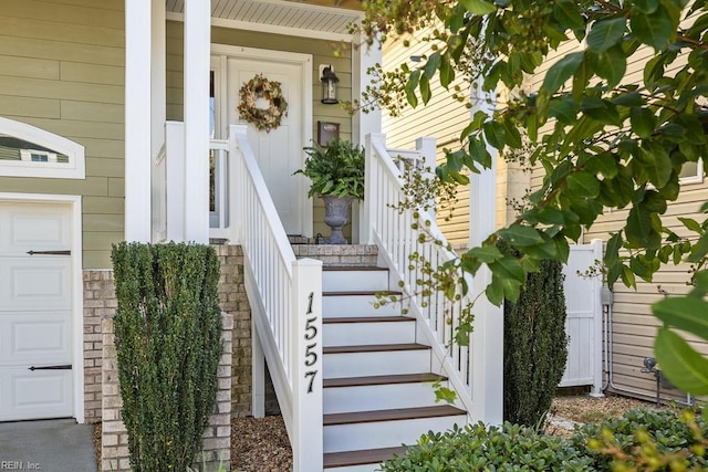 entrance to property featuring covered porch