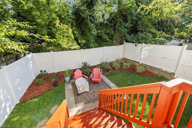 view of yard featuring a fenced backyard and a patio