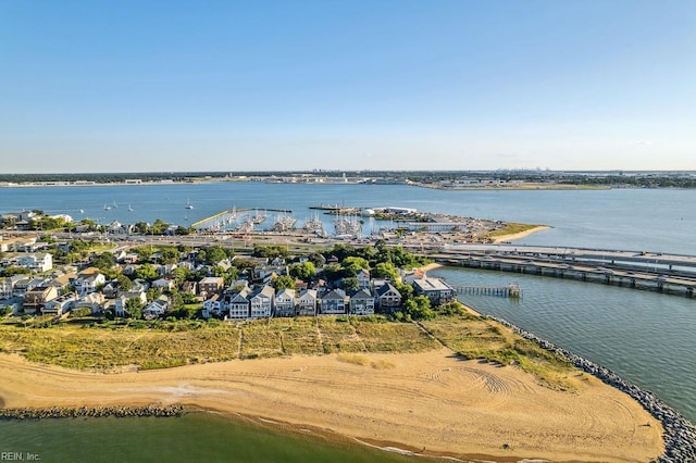 drone / aerial view featuring a residential view and a water view