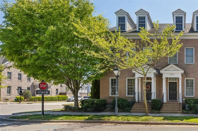 multi unit property with brick siding