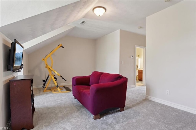living area featuring carpet, visible vents, lofted ceiling, and baseboards