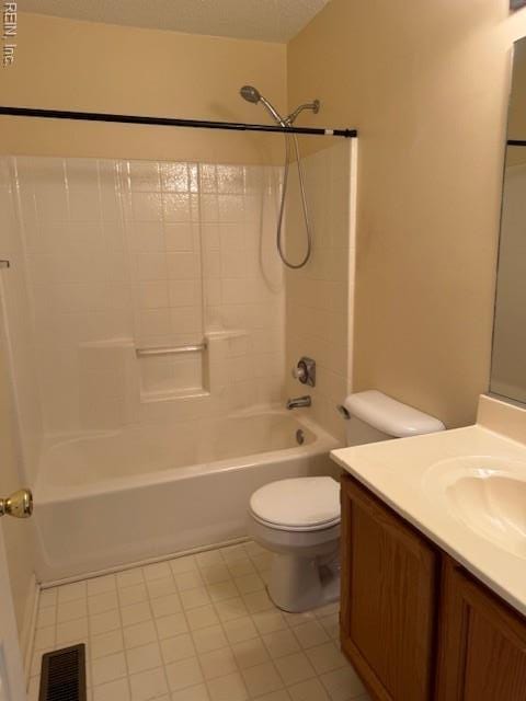 full bathroom with tile patterned flooring, visible vents, shower / bath combination, toilet, and vanity