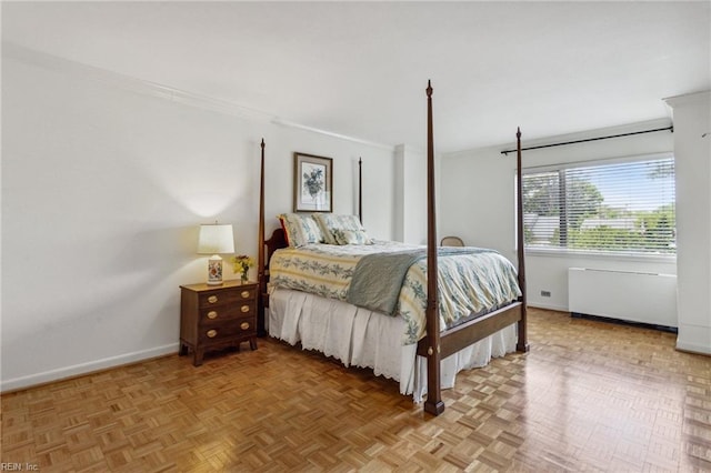 7320 Glenroie Ave Unit 2F, Norfolk, VA 23505 - bedroom featuring baseboards, ornamental molding, and radiator heating unit