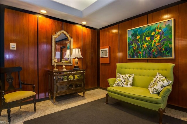 7320 Glenroie Ave Unit 2F, Norfolk, VA 23505 - sitting room featuring recessed lighting, wood walls, and carpet floors