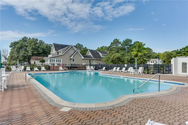 7320 Glenroie Ave Unit 2F, Norfolk, VA 23505 - community pool featuring a patio and fence
