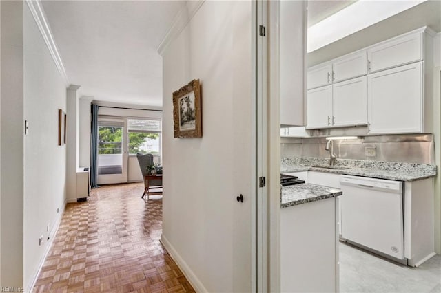 7320 Glenroie Ave Unit 2F, Norfolk, VA 23505 - corridor featuring crown molding, a sink, and baseboards