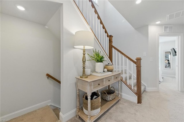 stairway with carpet, visible vents, recessed lighting, and baseboards