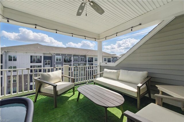 balcony featuring a ceiling fan and outdoor lounge area