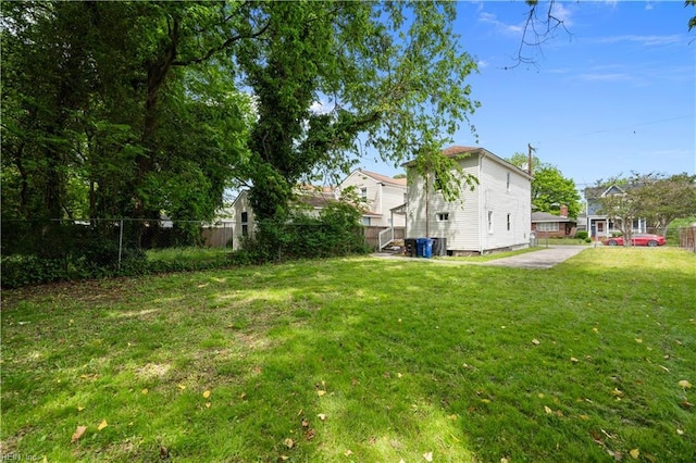 view of yard with fence and a patio area