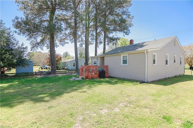 view of yard with a deck
