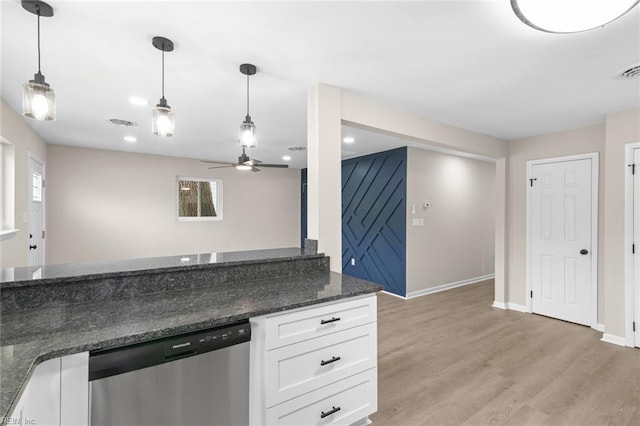 kitchen with light wood-type flooring, baseboards, white cabinetry, dishwasher, and hanging light fixtures