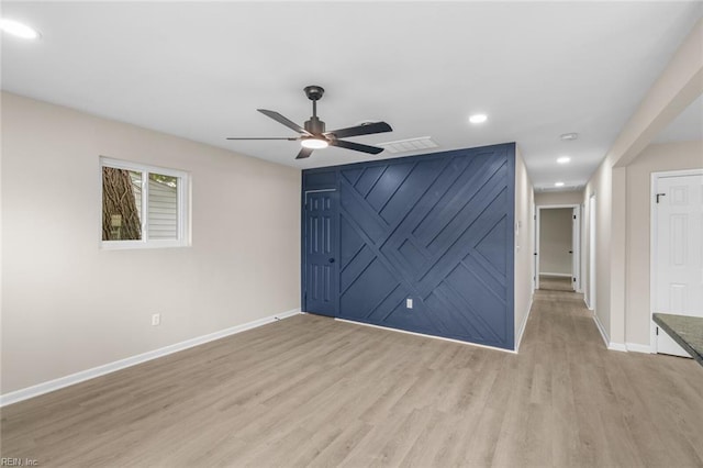 unfurnished room with light wood finished floors, baseboards, recessed lighting, visible vents, and ceiling fan