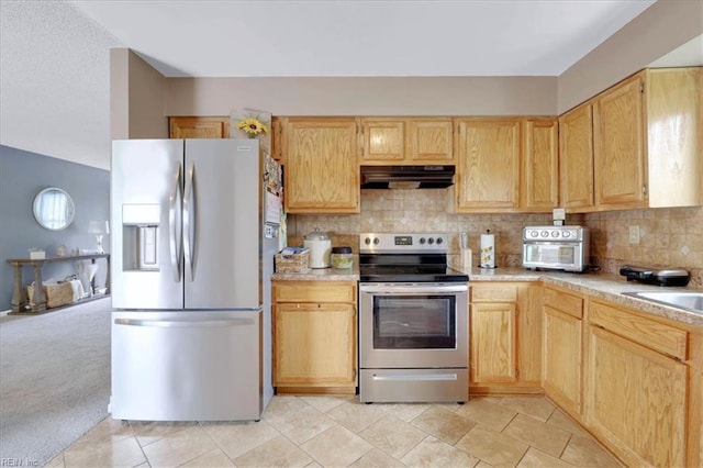 4904 Aquarius Ct, Virginia Beach, VA 23464 - kitchen featuring stainless steel appliances, under cabinet range hood, light countertops, and backsplash