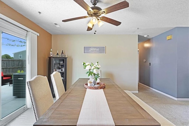 4904 Aquarius Ct, Virginia Beach, VA 23464 - dining area featuring ceiling fan, carpet flooring, baseboards, and a textured ceiling