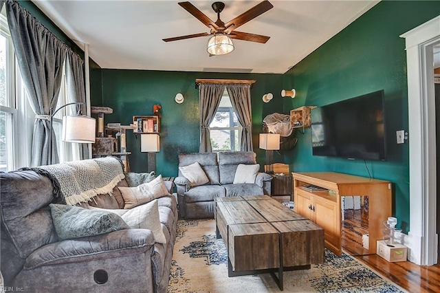 living room with a ceiling fan