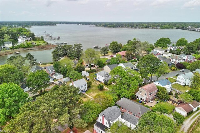 birds eye view of property with a residential view and a water view