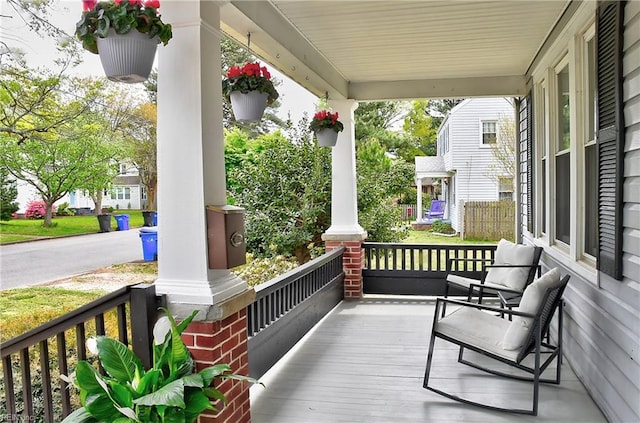 wooden terrace with covered porch
