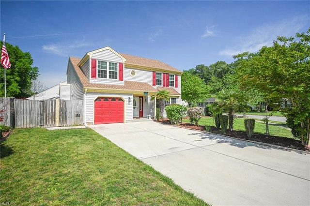 traditional-style home with a garage, driveway, a front lawn, and fence