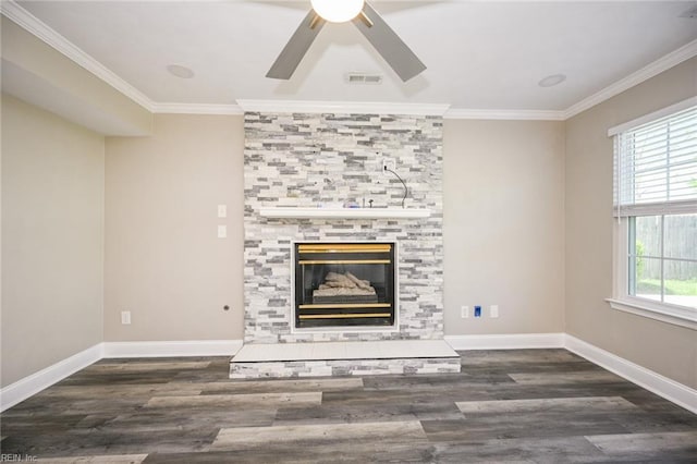 unfurnished living room with wood finished floors, visible vents, and ornamental molding