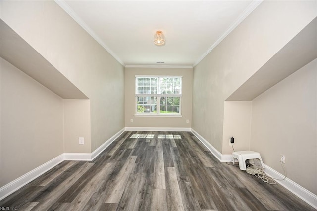bonus room featuring baseboards and dark wood-type flooring
