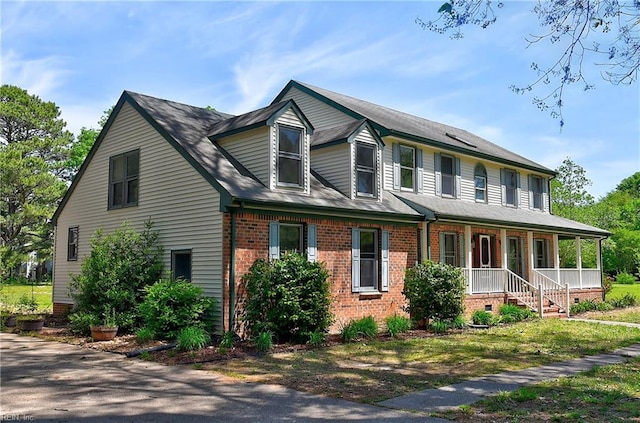 617 Saint Brides Rd W, Chesapeake, VA 23322 - view of front of house with brick siding and a porch