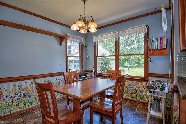 617 Saint Brides Rd W, Chesapeake, VA 23322 - dining space with baseboards, wallpapered walls, a notable chandelier, and crown molding