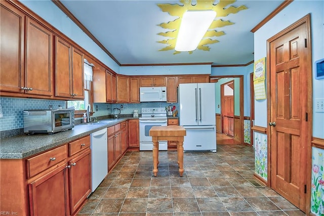 617 Saint Brides Rd W, Chesapeake, VA 23322 - kitchen featuring a sink, crown molding, white appliances, a toaster, and dark countertops
