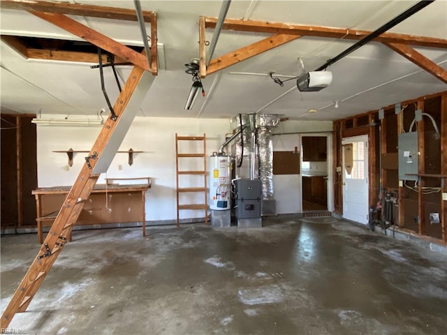 garage featuring water heater, electric panel, and a garage door opener