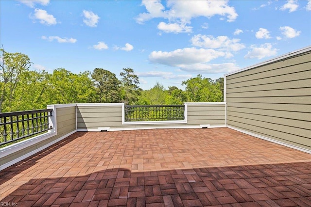 view of patio with a balcony