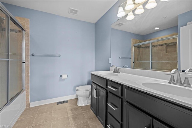 bathroom with visible vents and a sink