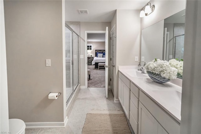 full bathroom with tile patterned floors, visible vents, a sink, and a shower stall
