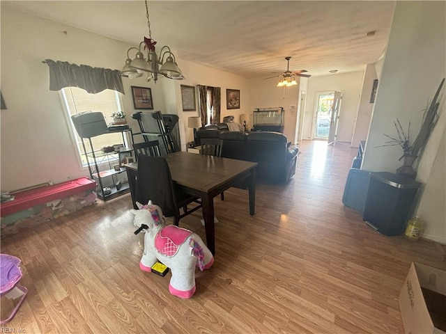 2310 S St S, Franklin, VA 23851 - dining room with wood finished floors and ceiling fan with notable chandelier
