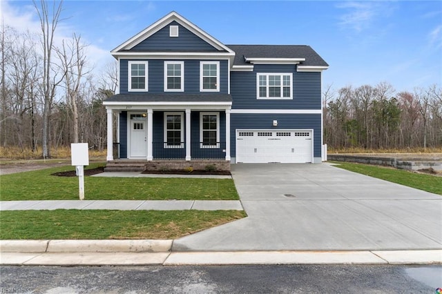 view of front of property with concrete driveway, a front lawn, covered porch, a garage, and roof with shingles