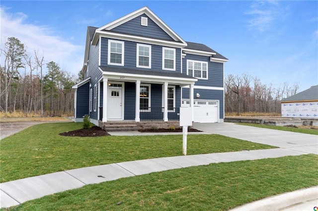 view of front facade featuring driveway, covered porch, a front yard, and a garage