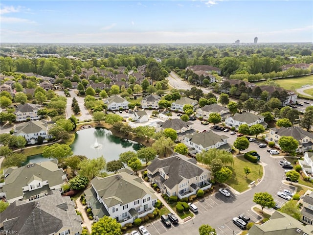 aerial view with a water view and a residential view