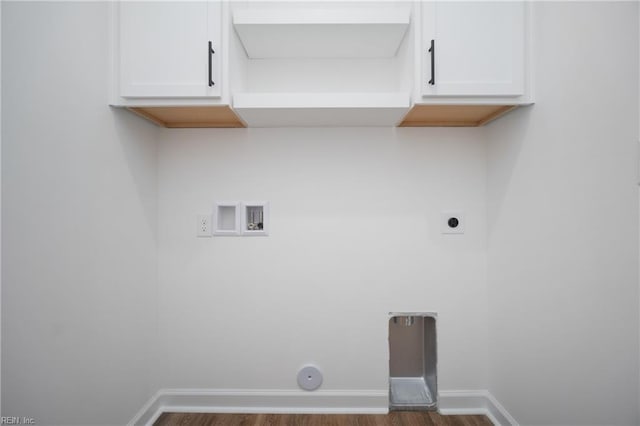 laundry room featuring hookup for an electric dryer, cabinet space, hookup for a washing machine, and dark wood-style floors