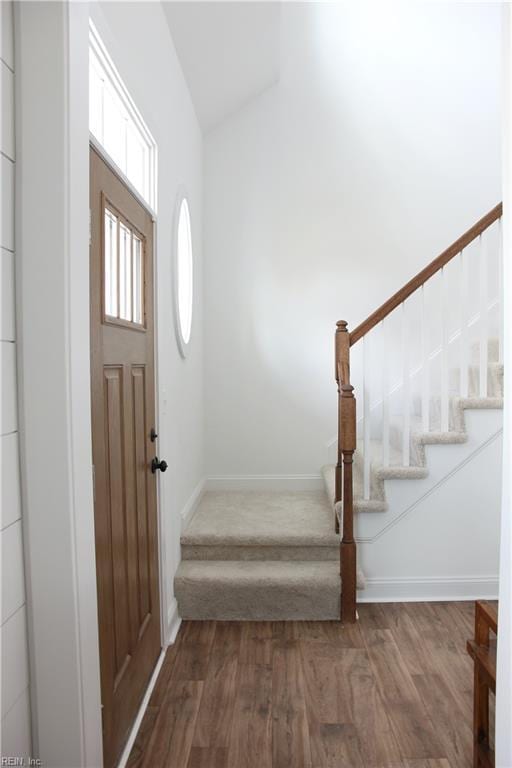 2229 Captiva Ln, Chesapeake, VA 23321 - foyer entrance featuring vaulted ceiling, stairway, baseboards, and wood finished floors