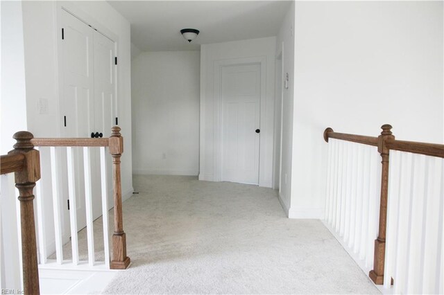 2229 Captiva Ln, Chesapeake, VA 23321 - hallway with baseboards, an upstairs landing, and carpet